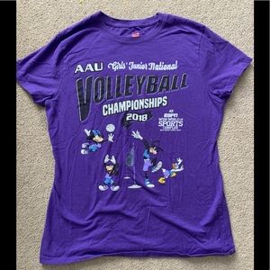 A cute, graphic and fun purple volleyball shirt.